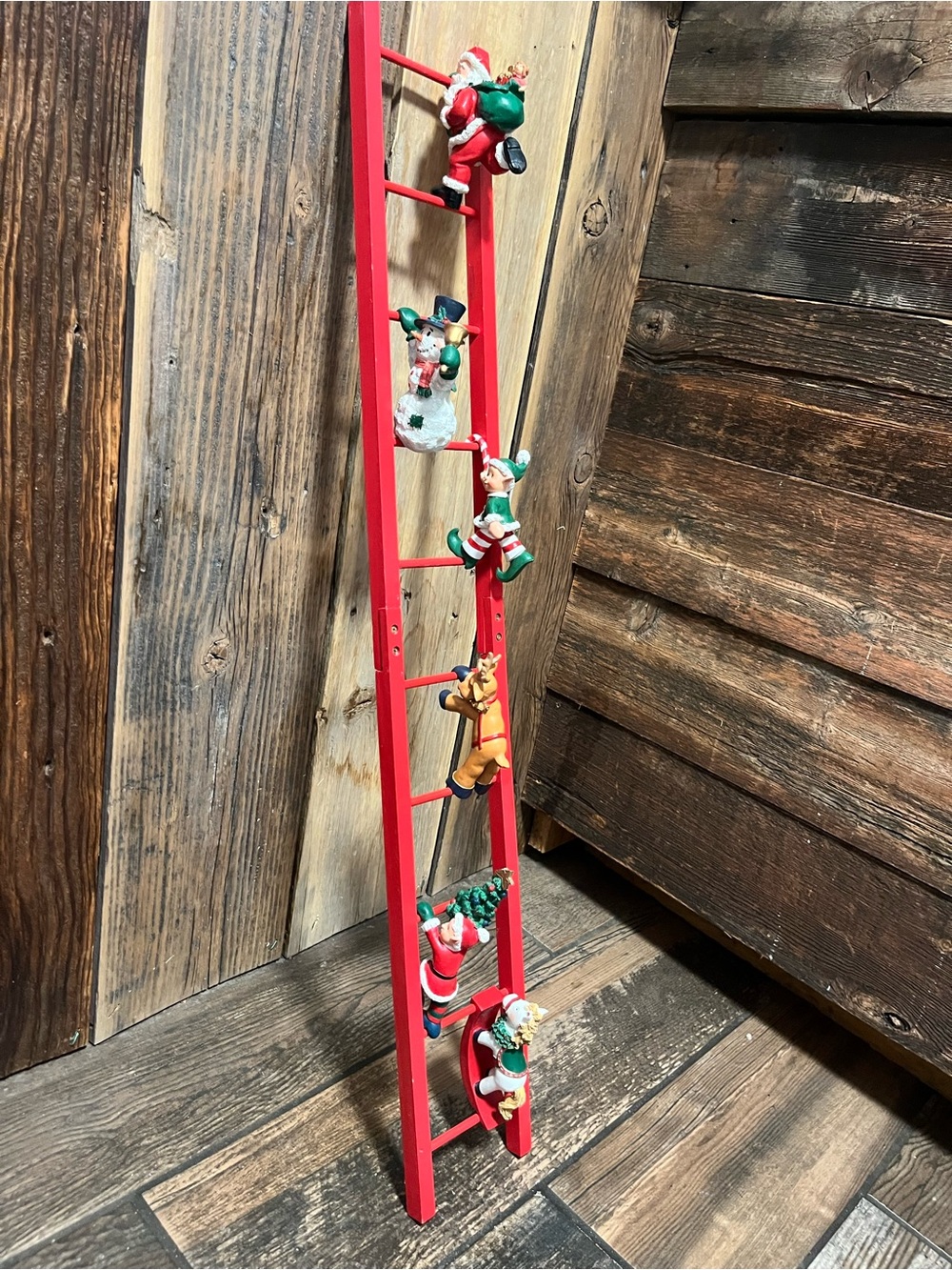 Red Decorative Ladder with Christmas Figurines